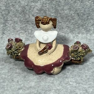 Clay Handcrafted Girl Child Figurine on Log with Flowers Vintage Country Prairie